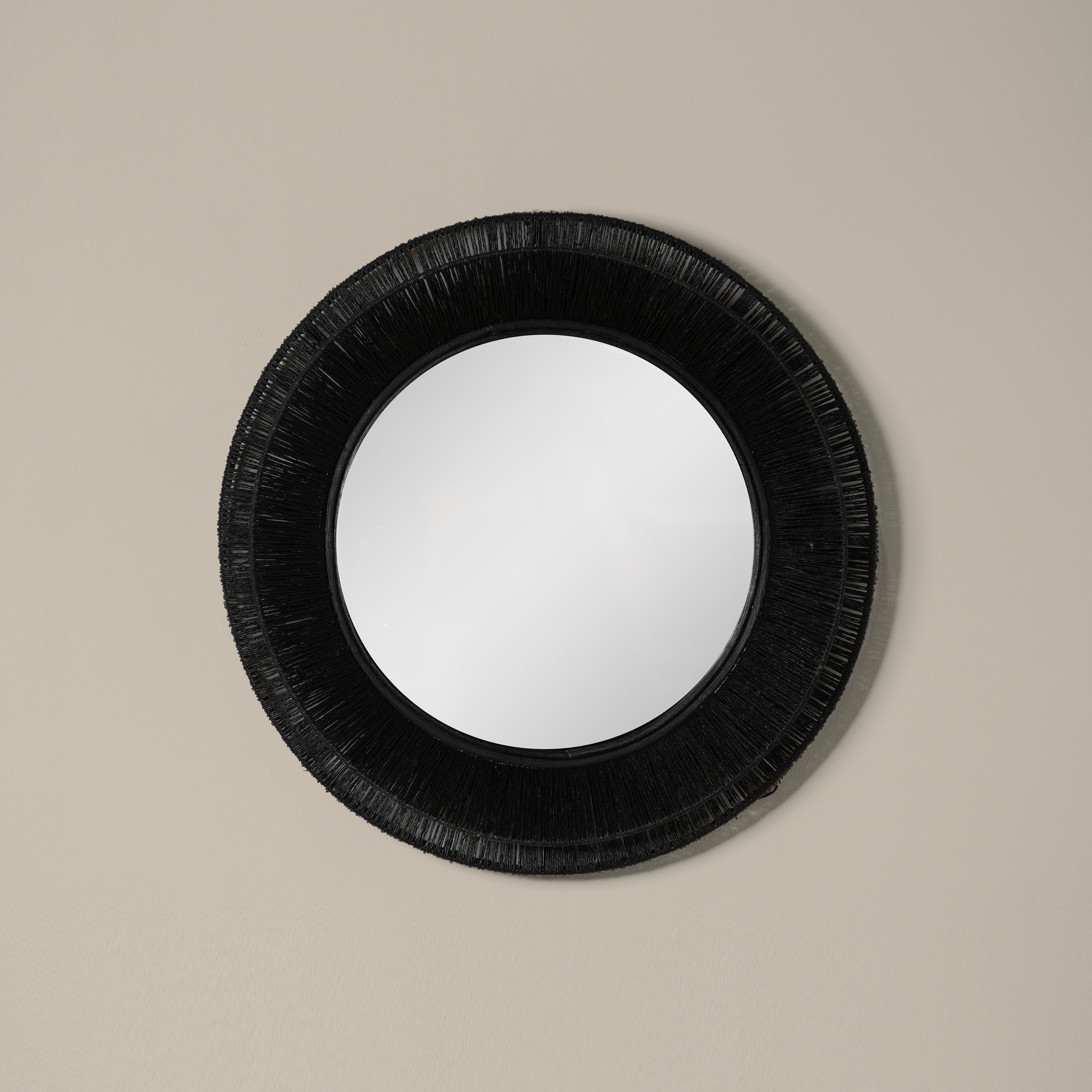Collins Small Jute Mirror in Black on a beige background at Addison West
