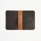 Leather Vertical Bifold Wallet in Dark Brown on a white background at Addison West