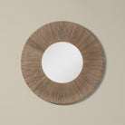 Highball Jute Round Mirror on a beige background at Addison West