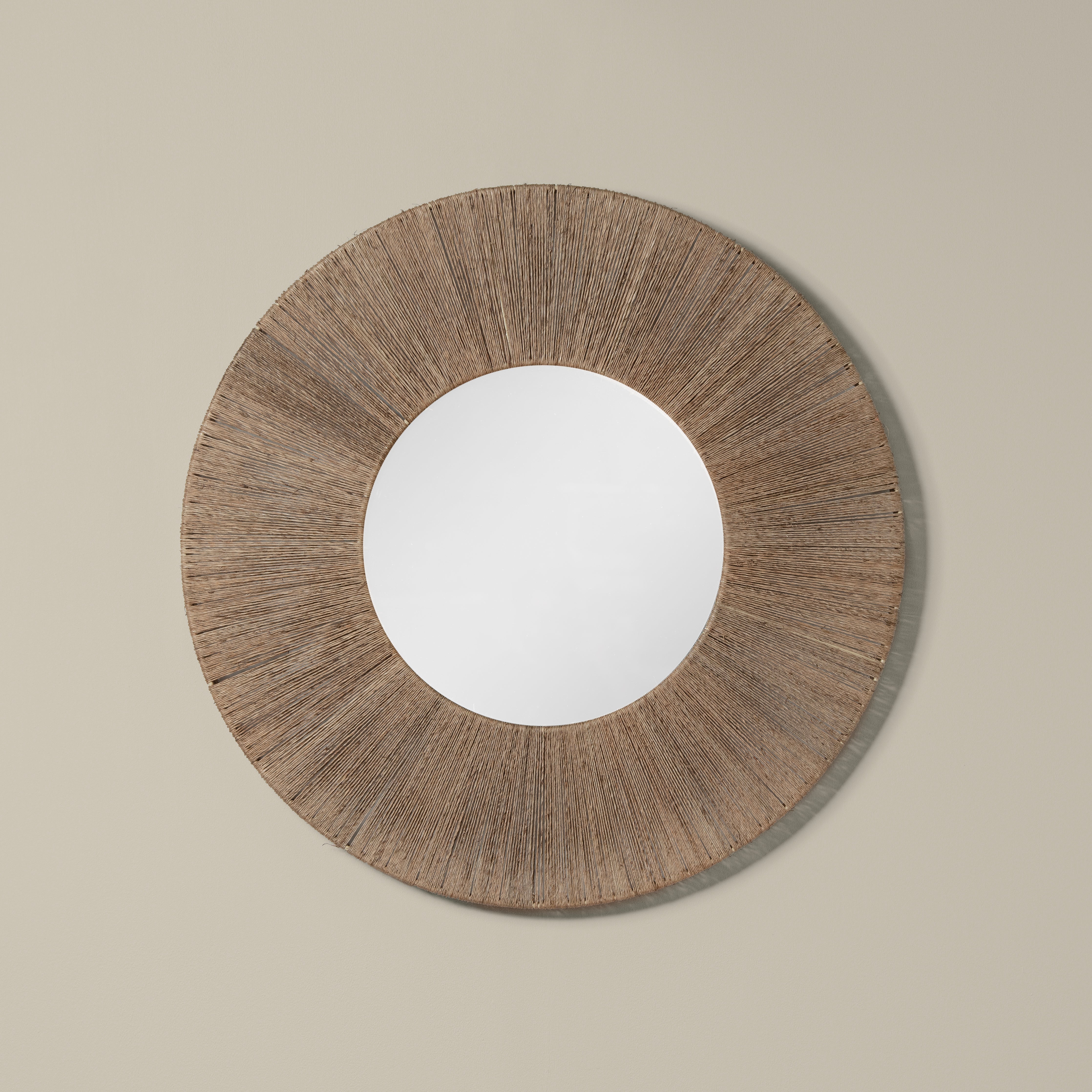 Highball Jute Round Mirror on a beige background at Addison West