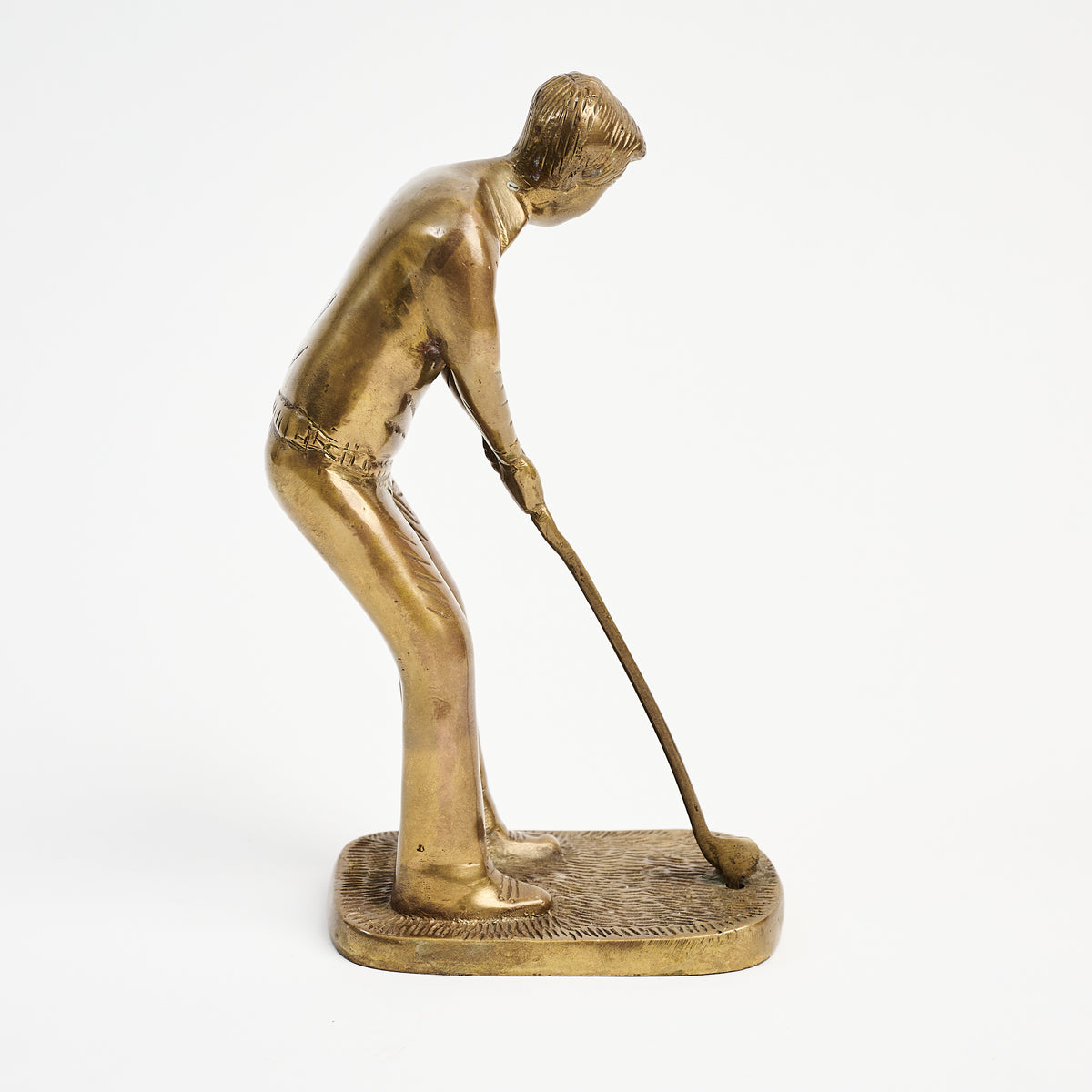 Vintage Brass Golfer on a white background at Addison West