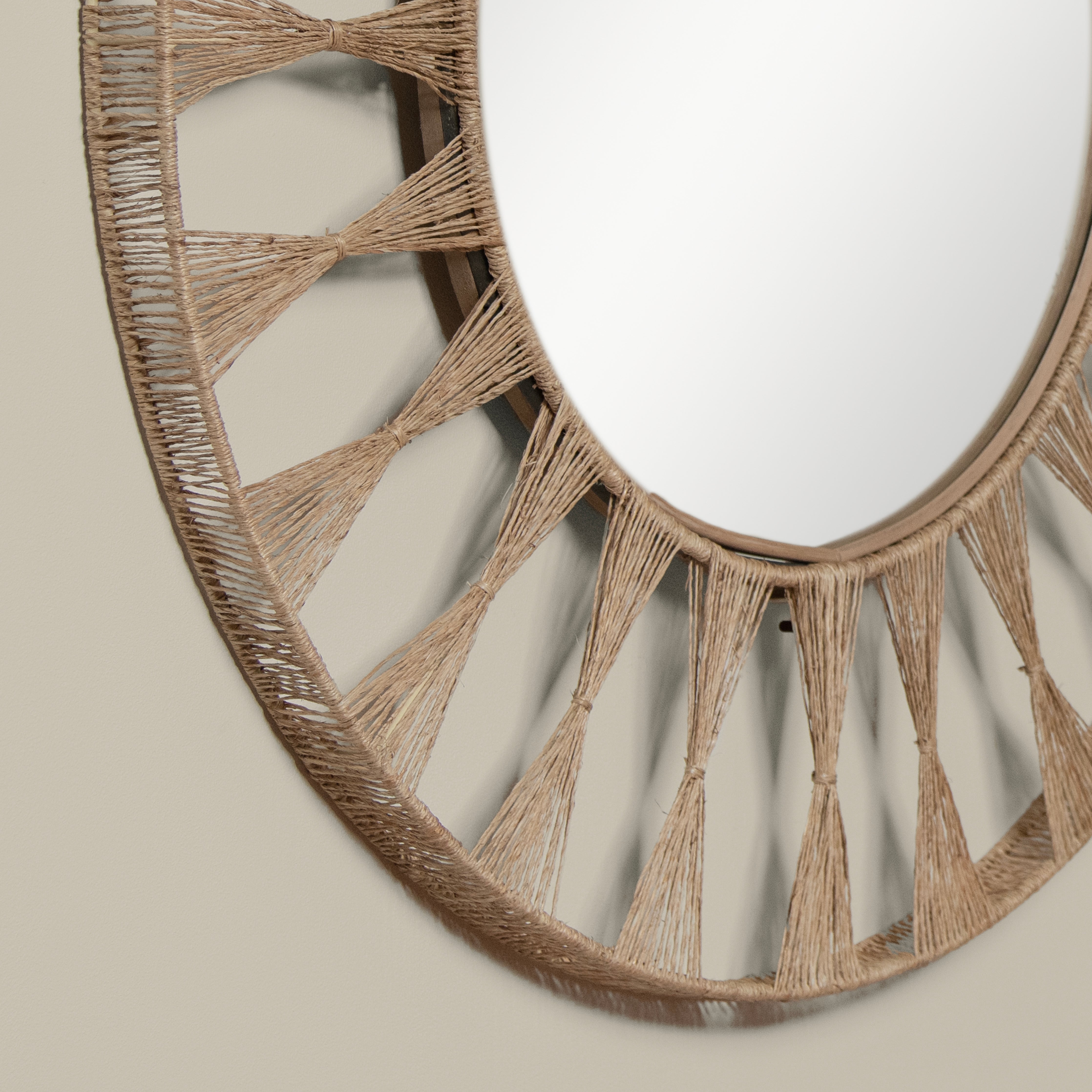 Close up of Ojai Round Mirror on a beige background at Addison West