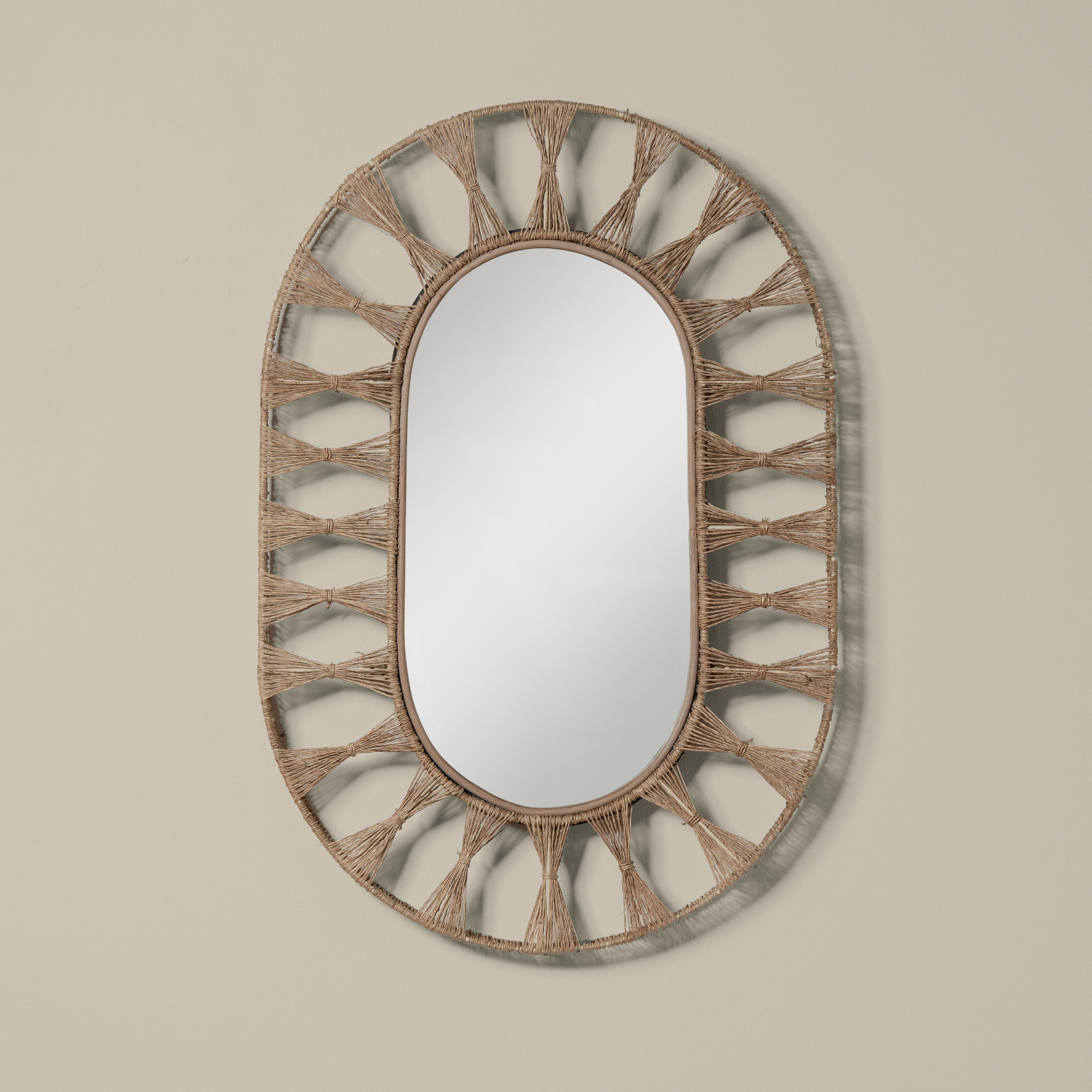 Ojai Oval Mirror on a beige background at Addison West