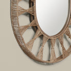 Close up of Ojai Oval Mirror on a beige background at Addison West
