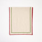 Holiday Ric Rac Trim Table Runner on a white background at Addison West