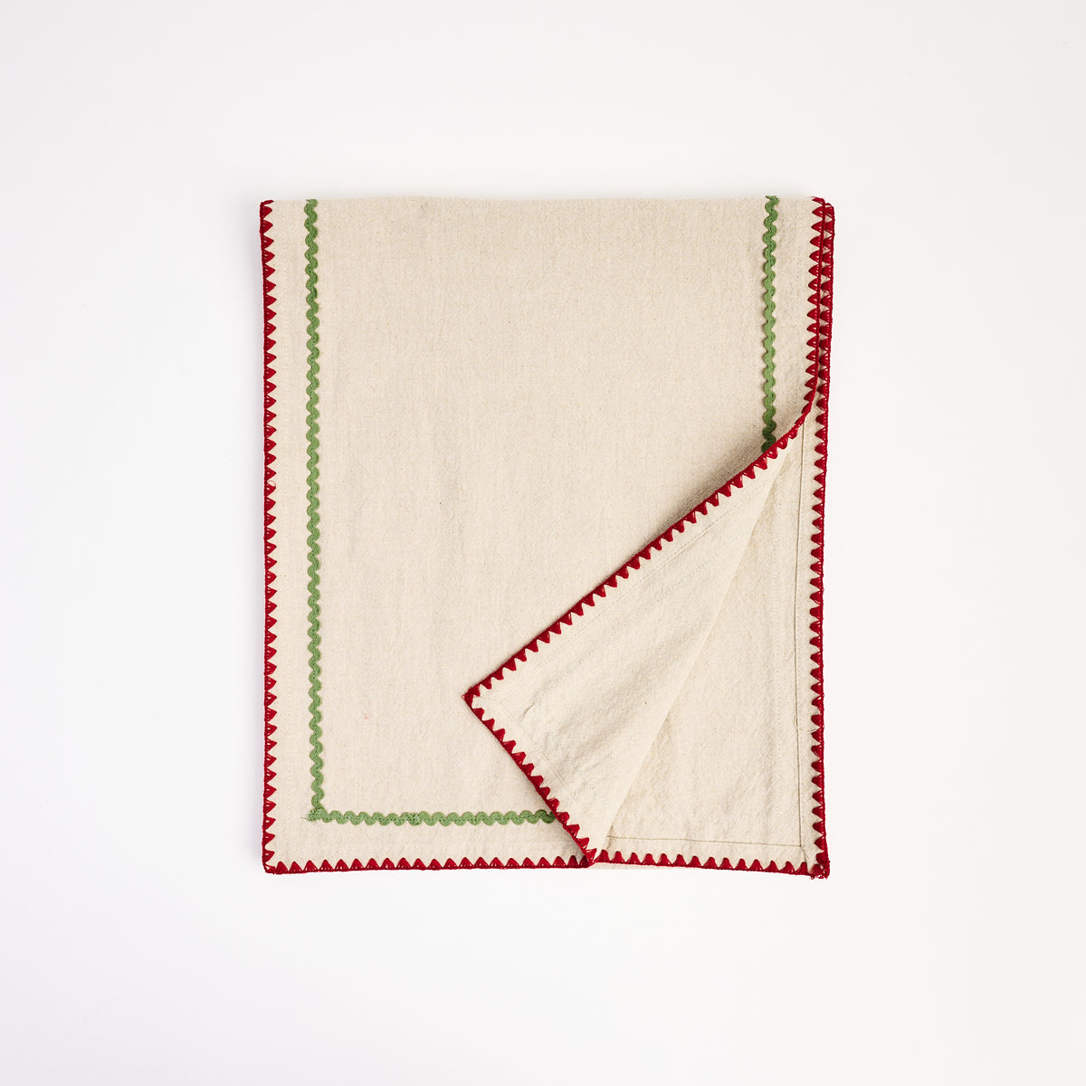 Holiday Ric Rac Trim Table Runner on a white background at Addison West