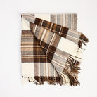 Dress Stewart Merino Throw Blanket on a white background at Addison West