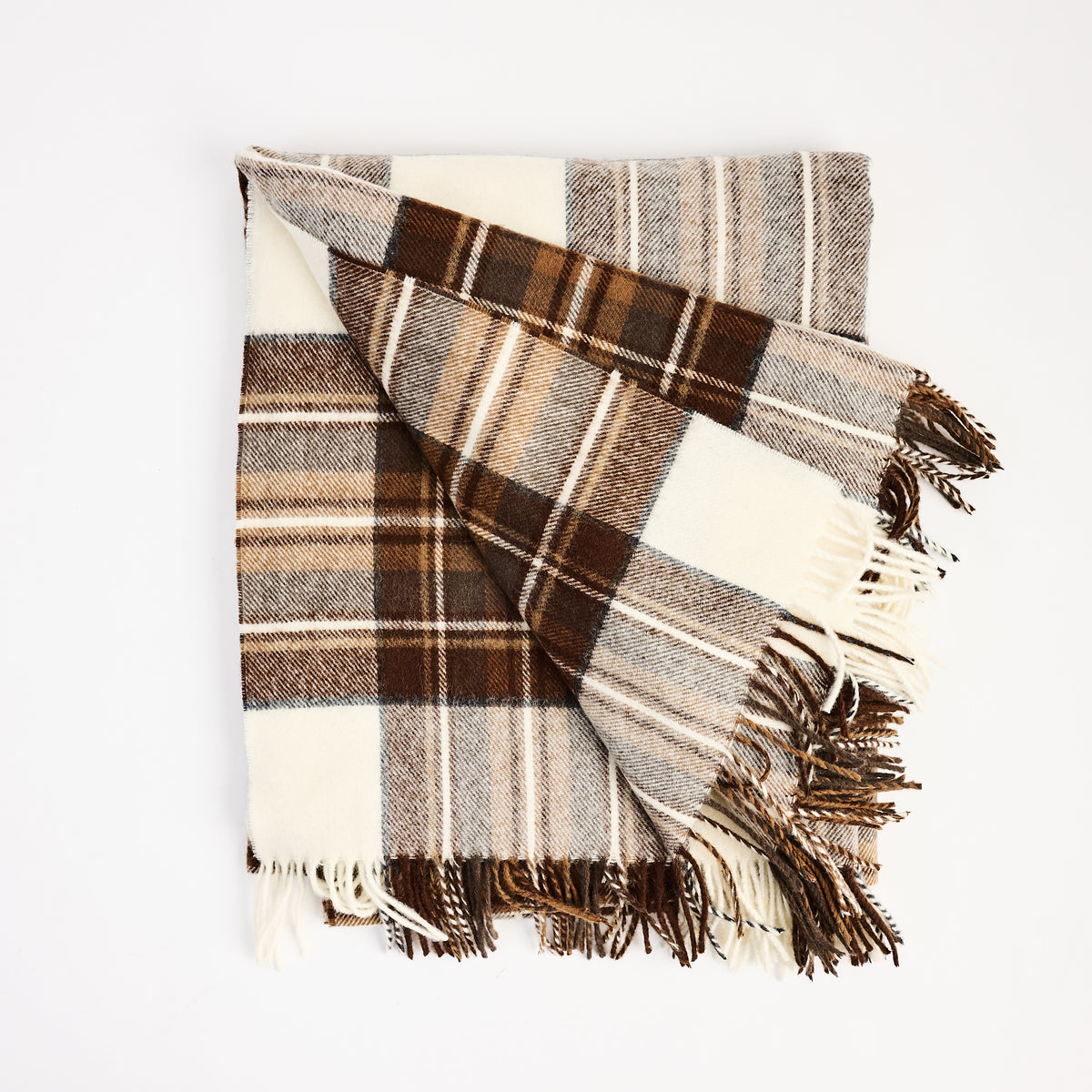 Dress Stewart Merino Throw Blanket on a white background at Addison West