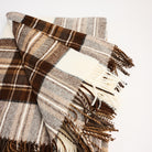 Dress Stewart Merino Throw Blanket on a white background at Addison West