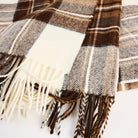 Dress Stewart Merino Throw Blanket on a white background at Addison West