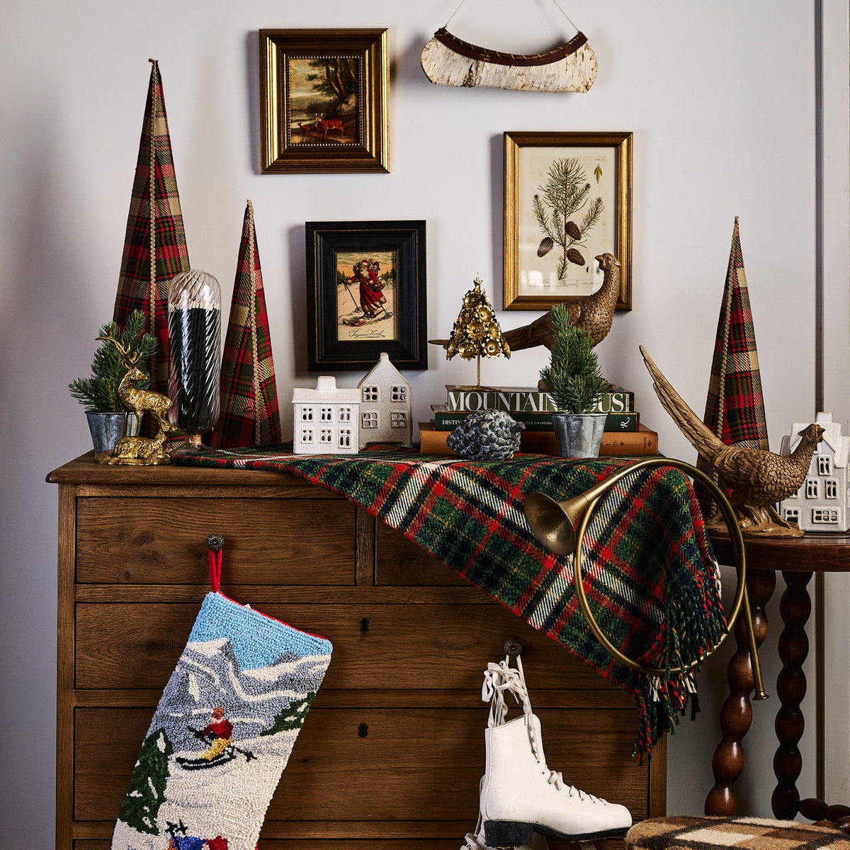 Tartan Plaid Christmas Trees and Christmas decor on a table at Addison West