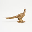 Female Pheasant Sculpture on a white background at Addison West