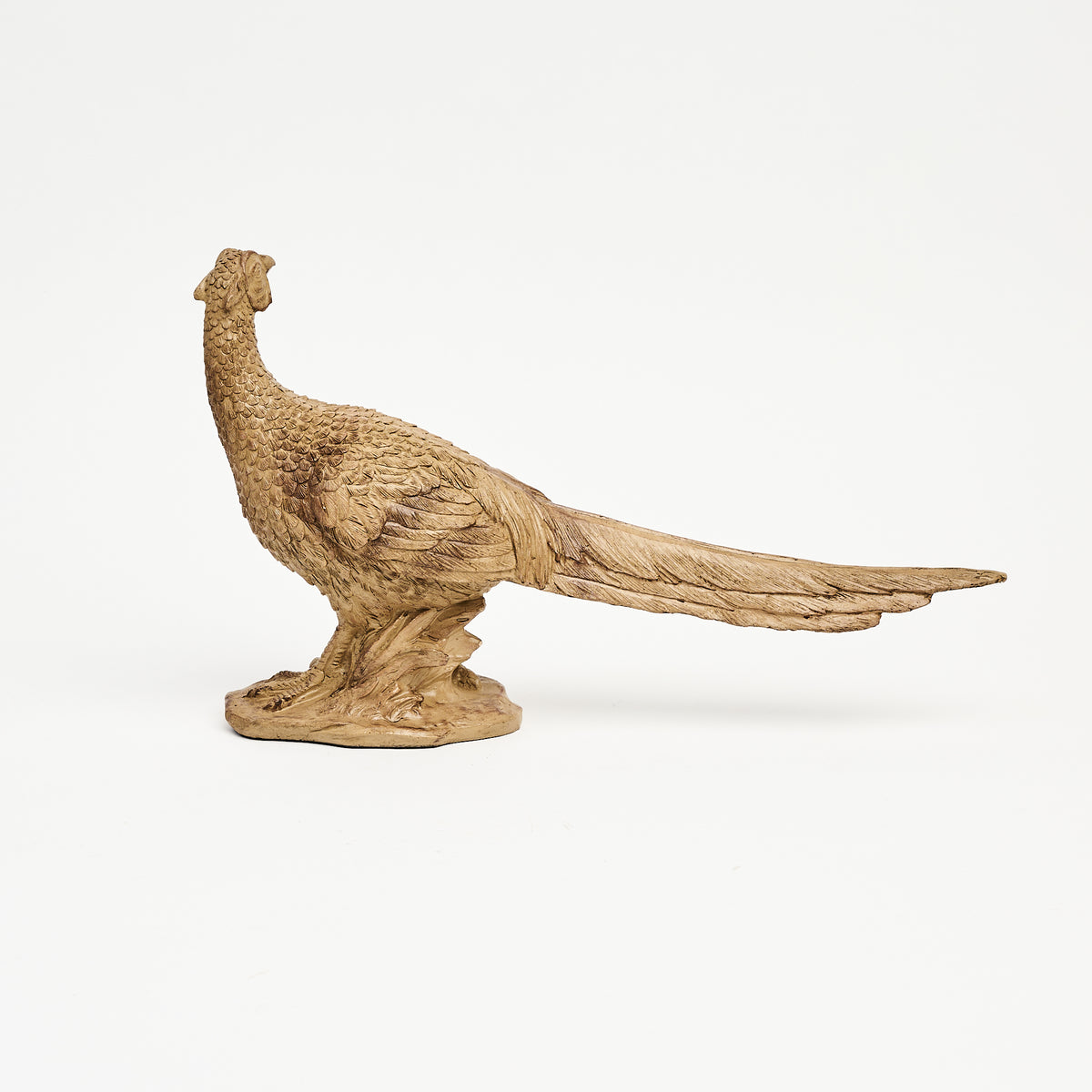 Female Pheasant Sculpture on a white background at Addison West