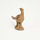 Female Pheasant Sculpture on a white background at Addison West