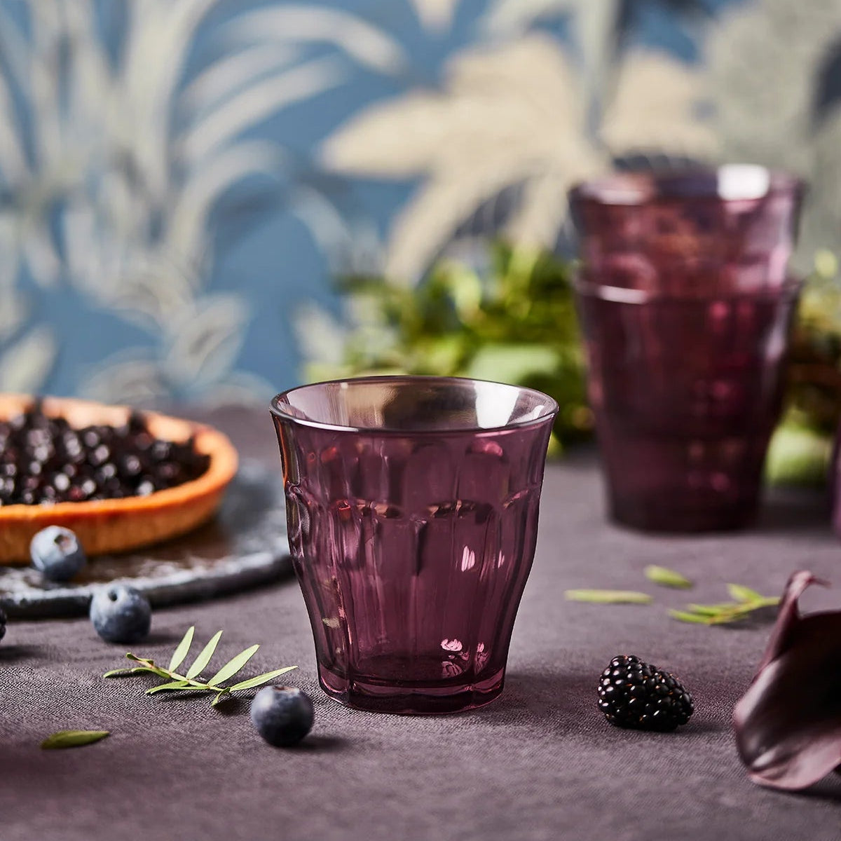 Durale Picardie plum tumbler on a table at Addison West