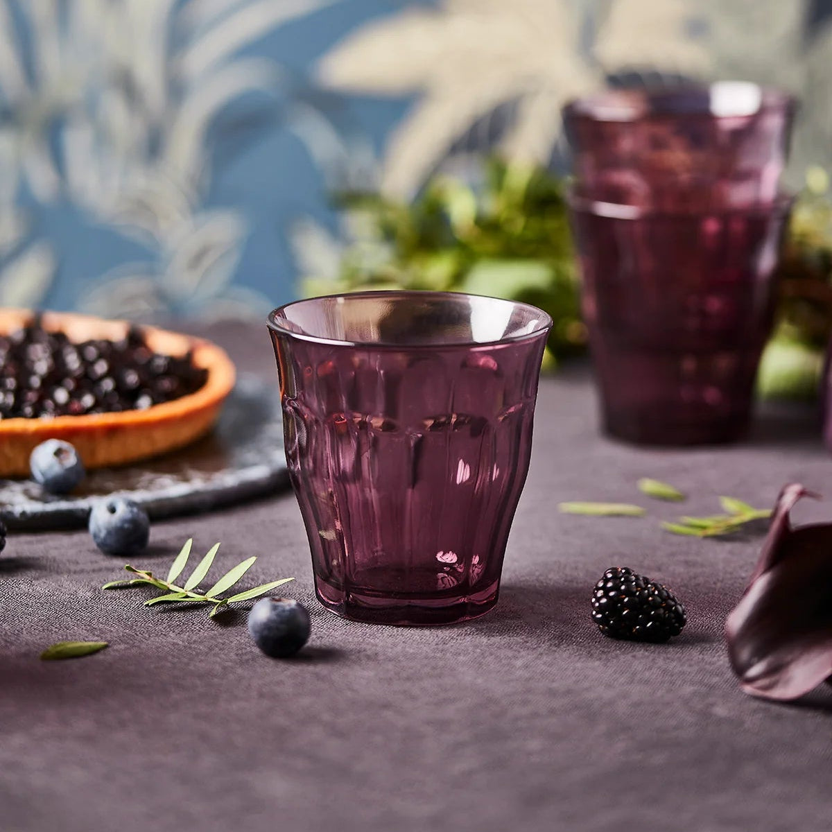 Duralex Le Picardie® Plum Glass Tumbler on a table at Addison West
