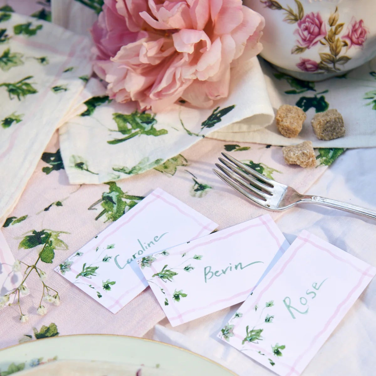 Darling Lemon illustrated place cards on a festive summer table at Addison West