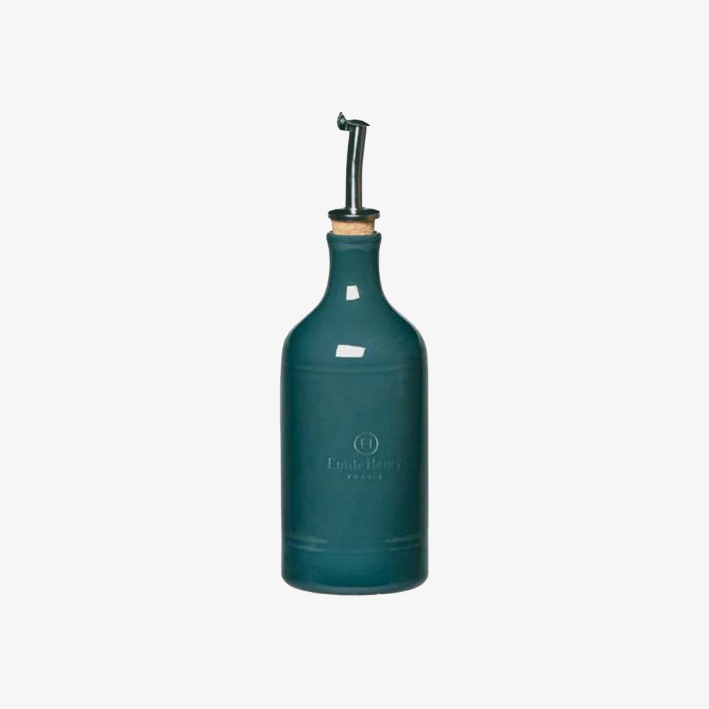 Emile Henry Oil Cruet in blue flame on a white background