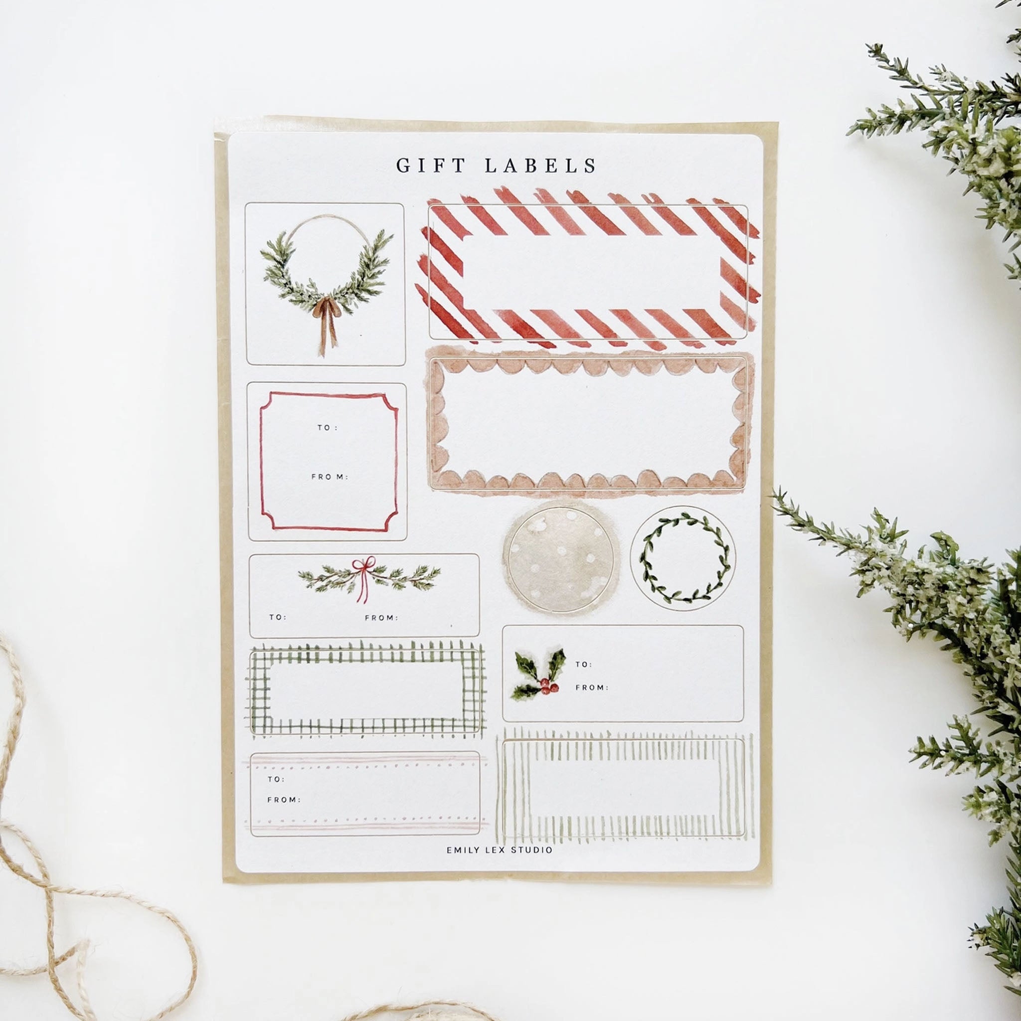 Sheet of gift labels with various designs on a white background