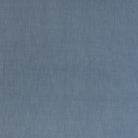 Cr Laine On Holiday Denim Throw Pillow on a white background at Addison West