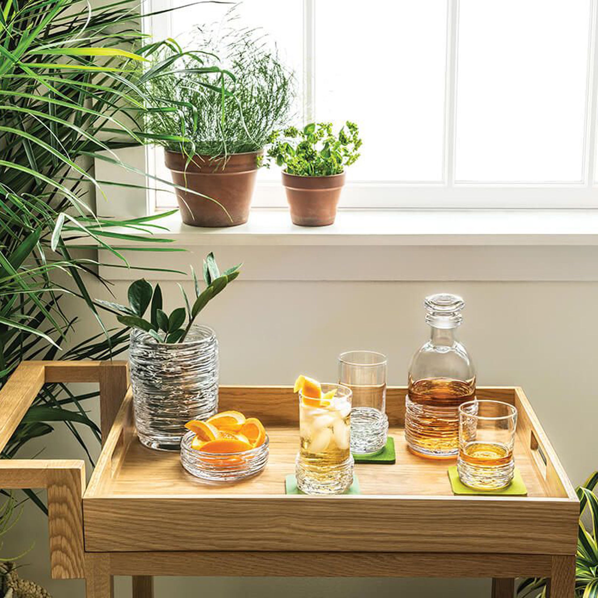 Simon Pearce Echo Lake Whiskey Glass, Set of 2 on a bar cart at Addison West