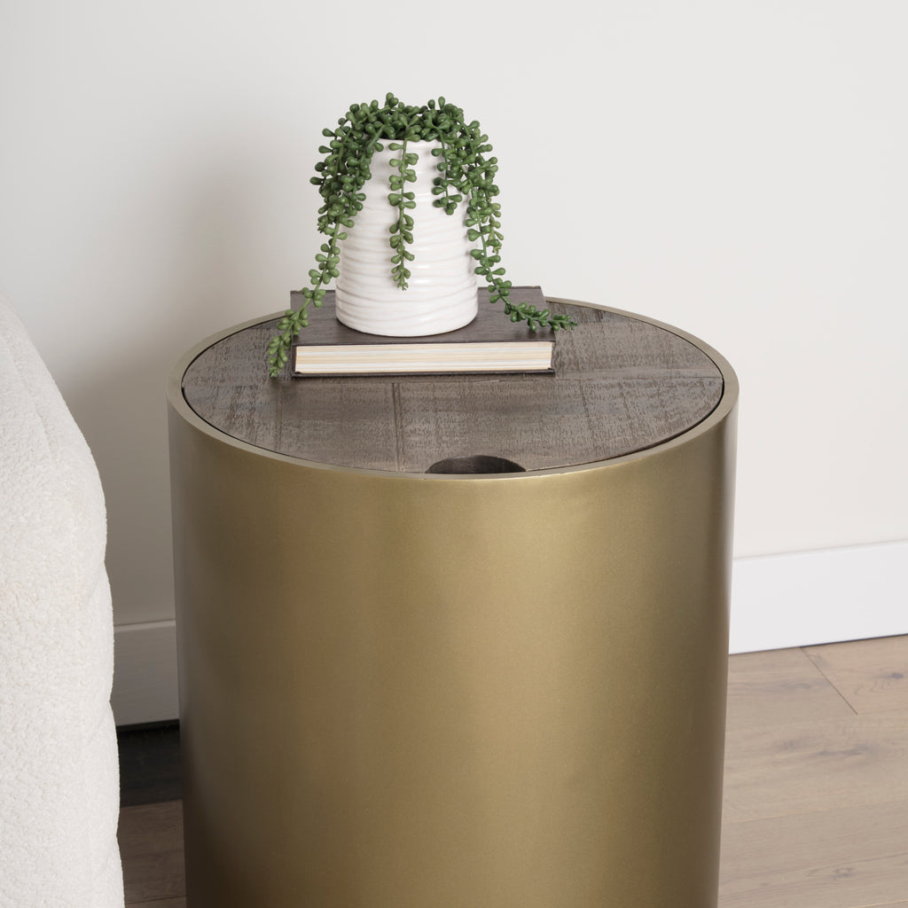 Eclipse Gold Metal Drum Base with Dark Brown Wood Top End/Side Table in a living room