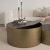 Eclipse Gold Metal Drum Base with Dark Brown Wood Top Nested Coffee Table in a living room