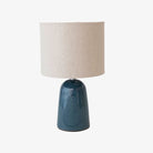 Small blue ceramic lamp with linen shade 