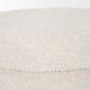 Close up of Elise Cream Boucle Upholstered Storage Ottoman on a white background