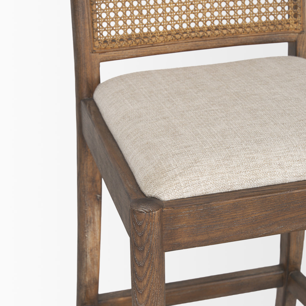 Close up of Elle Rounded Caneback Medium Brown Wood with Oatmeal Fabric Counter on a white background