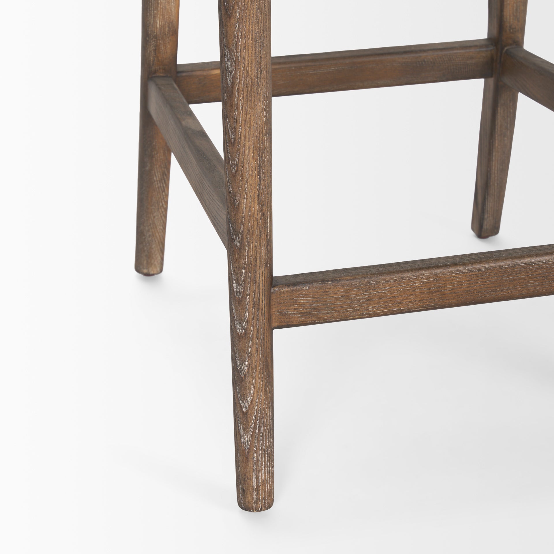 Close up of Elle Rounded Caneback Medium Brown Wood with Oatmeal Fabric Counter on a white background