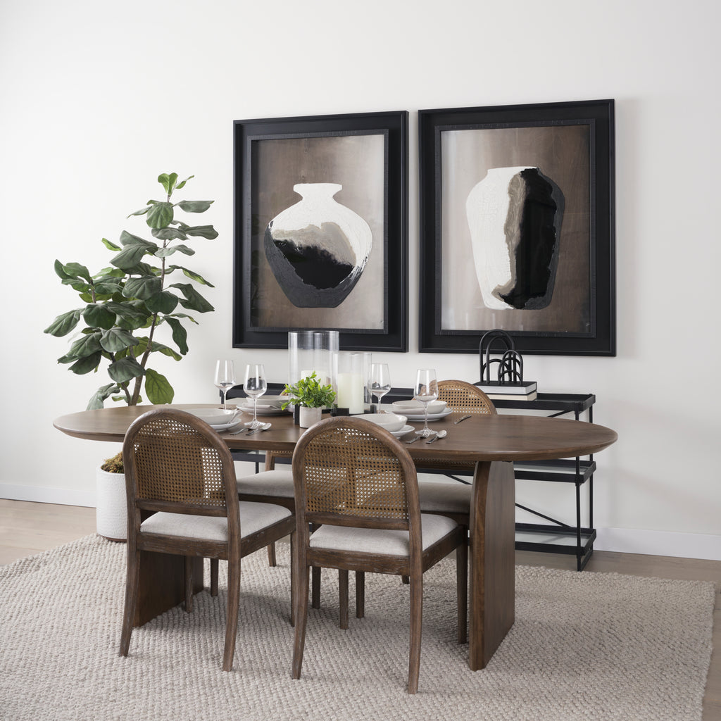 Elle Rounded Caneback Medium Brown Wood with Oatmeal Fabric Dining Chair in a dining room with a table and art on the walls