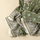 Close up of Elowen Block Print Tablecloth on a beige background at Addison West