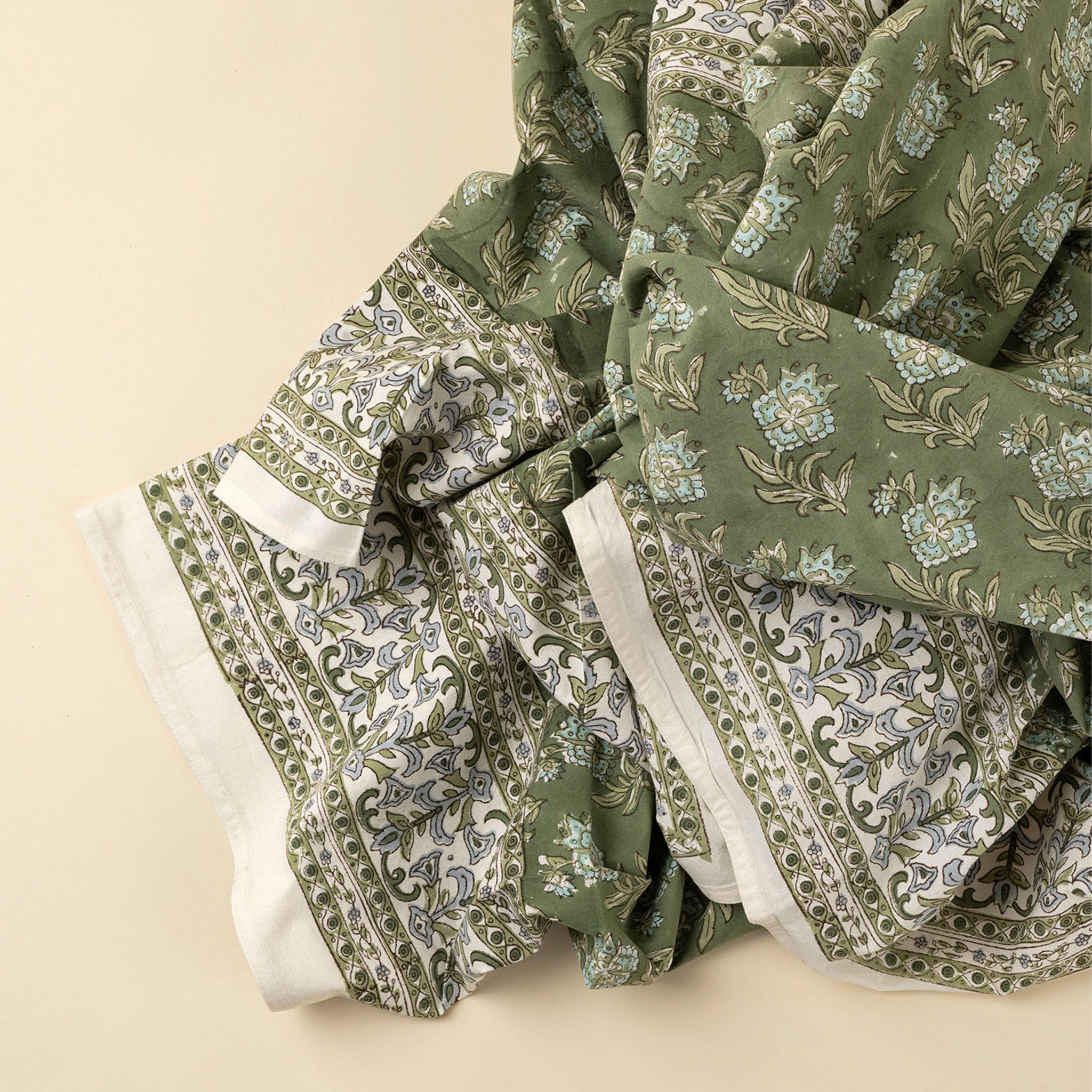 Close up of Elowen Block Print Tablecloth on a beige background at Addison West