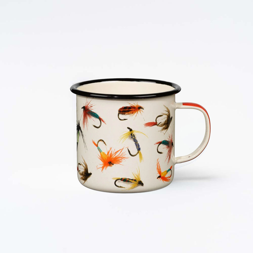 Cream enamel mug with with black rim with fishing flies