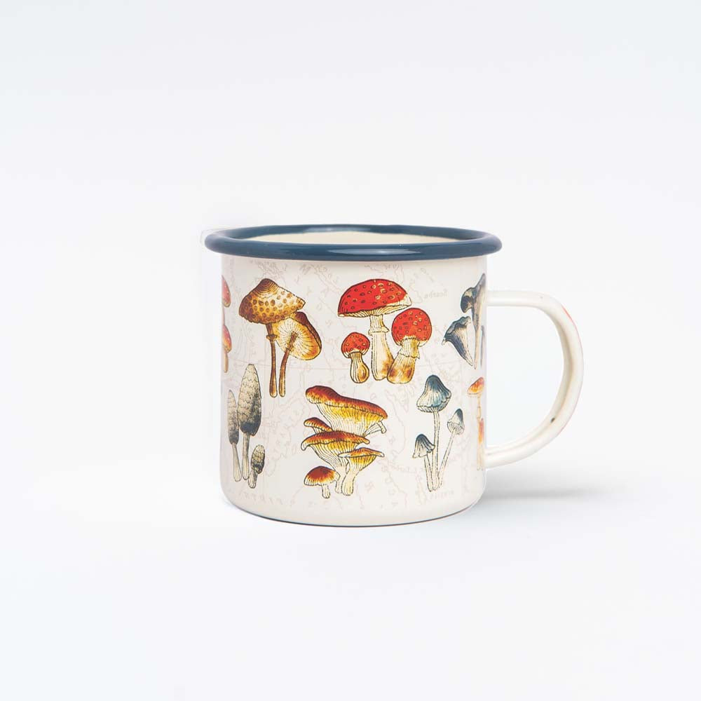 Enamel mug with illustrated mushroom motif on a white background