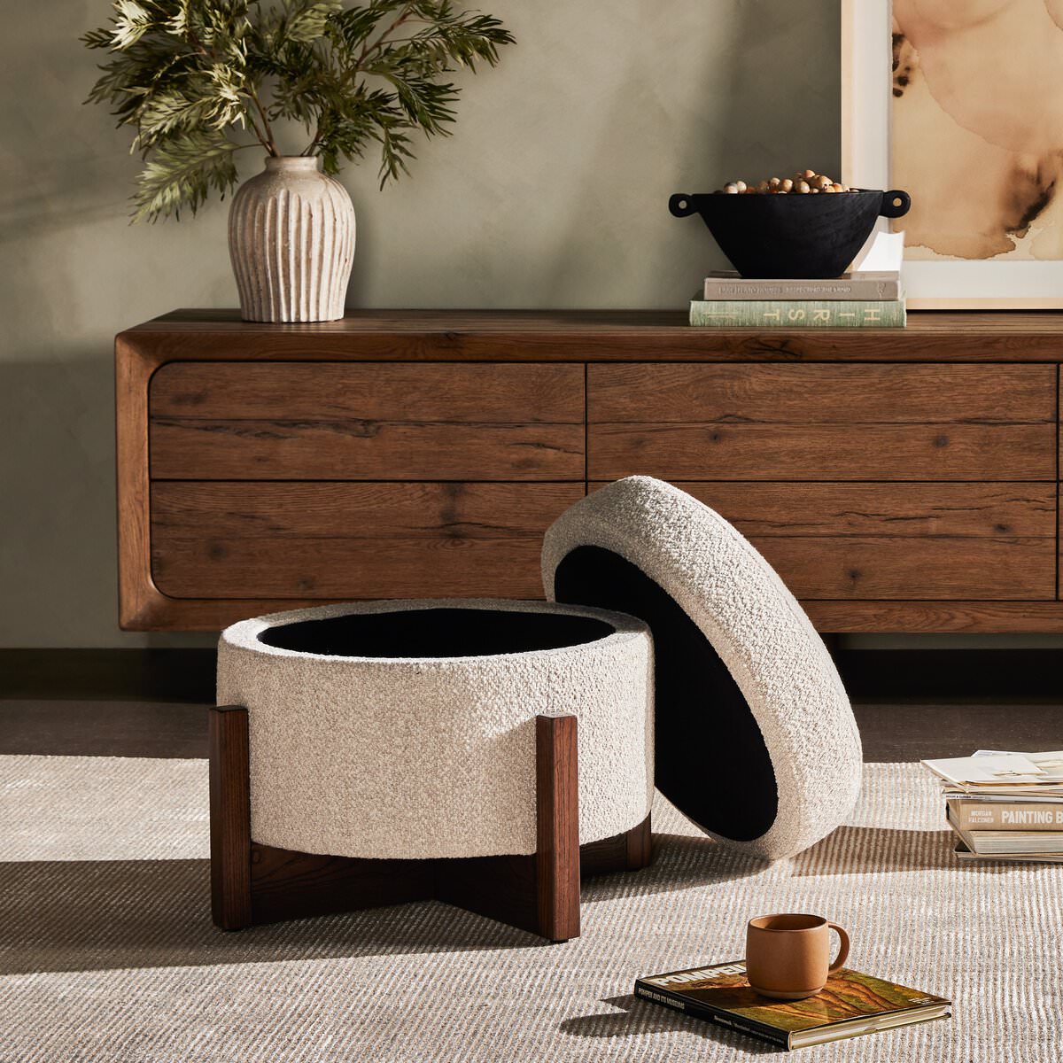 Esben Storage Ottoman in Sattley Fog in a modern living room at Addison West