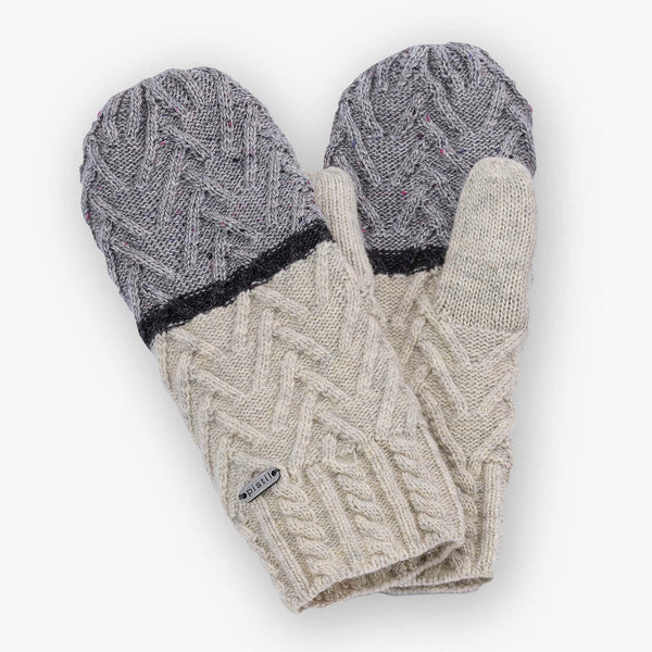 Pistil brand estes mitten with creme and grey cables on a white background