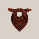 Moismont Scarf Achille N°851 in Violin on a model at Addison West on a beige background at Addison West