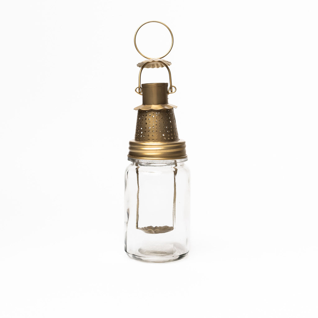 Fhia lantern in brass in on a white background