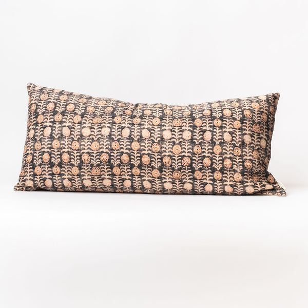 Indaba florio pillow with burgundy background and block print pattern on a white background