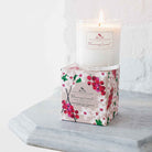Paper Soap Factory Flowering Currant Soy Candle on a white marble shelf