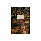 Notebook with muted mushroom pattern on the front on a white background