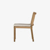 Four Hands Zuma Dining Chair with beige cushion and woven back in Dune Ash on a white background