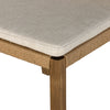 Four Hands Zuma Dining Chair with beige cushion and woven back in Dune Ash on a white background