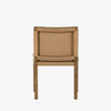 Four Hands Zuma Dining Chair with beige cushion and woven back in Dune Ash on a white background