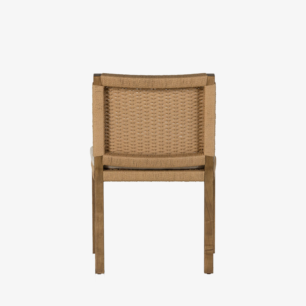 Four Hands Zuma Dining Chair with beige cushion and woven back in Dune Ash on a white background