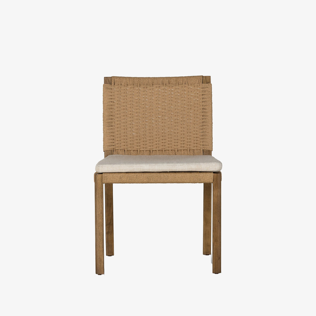 Four Hands Zuma Dining Chair with beige cushion and woven back in Dune Ash on a white background