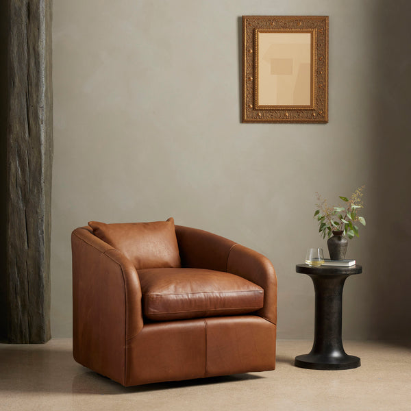 Four Hands Topanga Swivel Chair In Heirloom Sienna in a living space with dark walls
