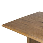 Close up of Four Hands 72" Glenview Dining Table in Weathered Oak Veneer on a white background at Addison West